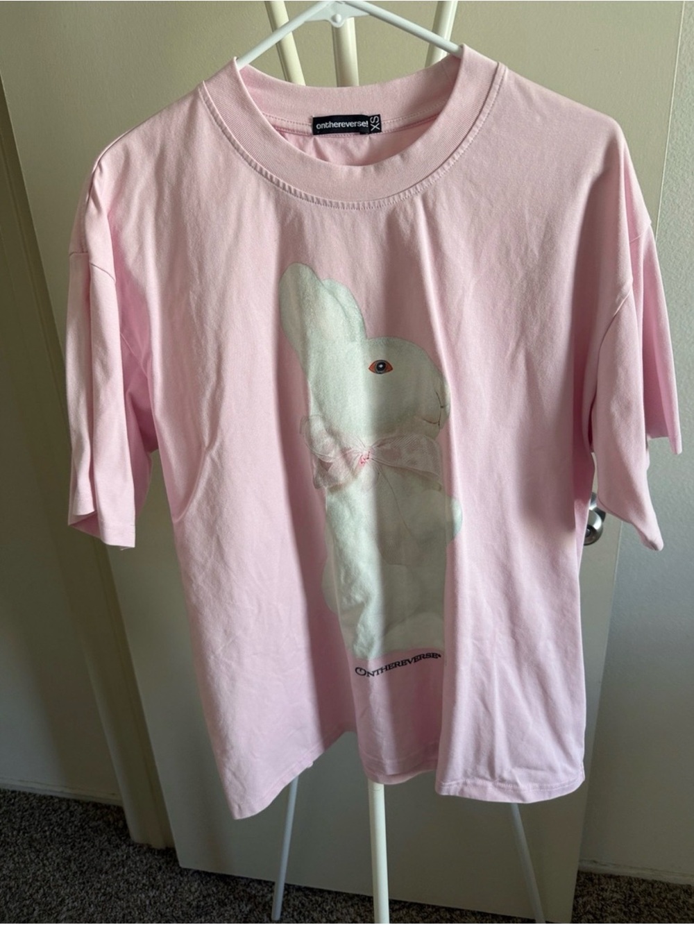 Reverse Light Pink Tee with White Bunny Graphic